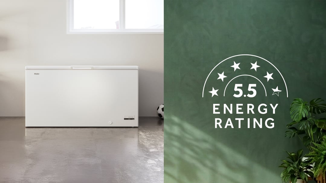 White Haier chest freezer in a room with a 5.5 energy rating graphic