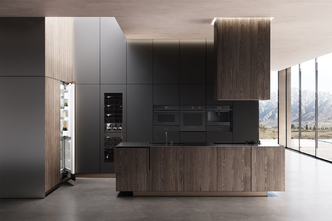 A modern kitchen with dark cabinetry, a wooden island, and a wine fridge