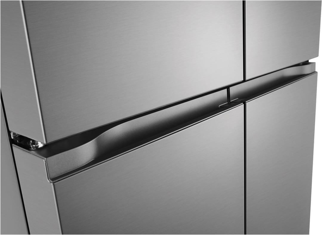 Close up of the brushed stainless steel finish and handles of a French door fridge