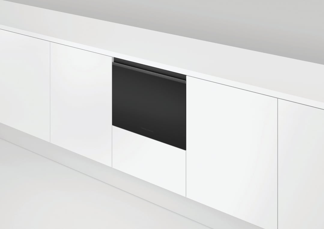 Black DishDrawer dishwasher integrated into white kitchen cabinetry