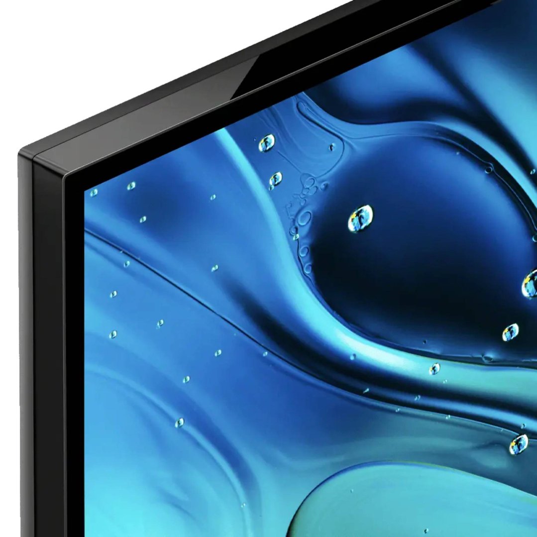 Close-up of the top left corner of a TV screen displaying a blue abstract image
