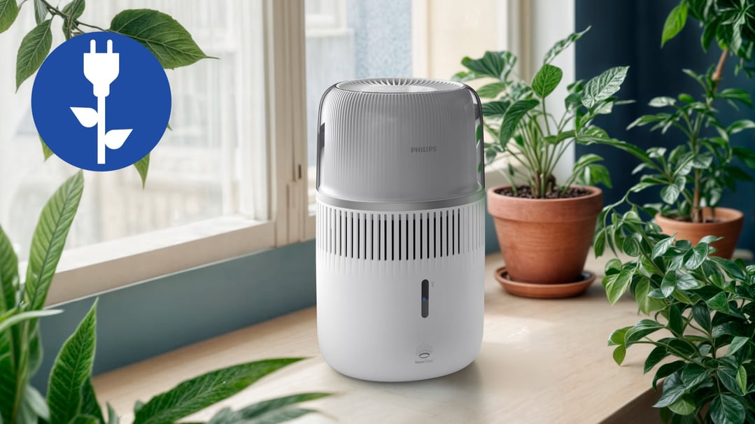Philips Series 5000 Evaporative Humidifier on a wooden surface with plants