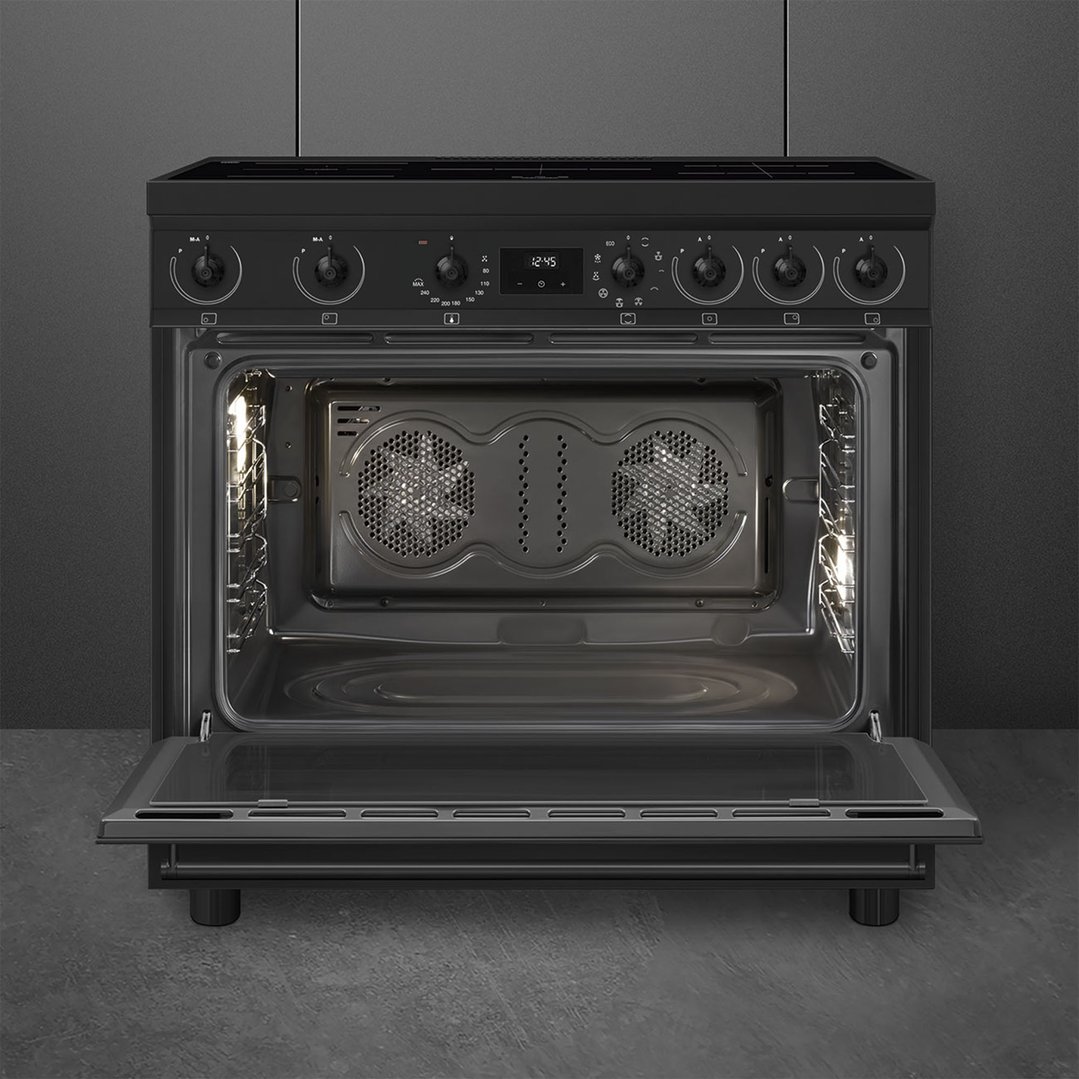 Black freestanding oven with the door open, showing the interior and controls