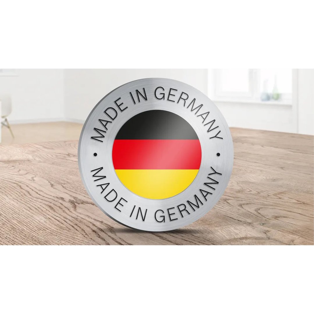 Made in Germany badge with German flag on a wooden surface