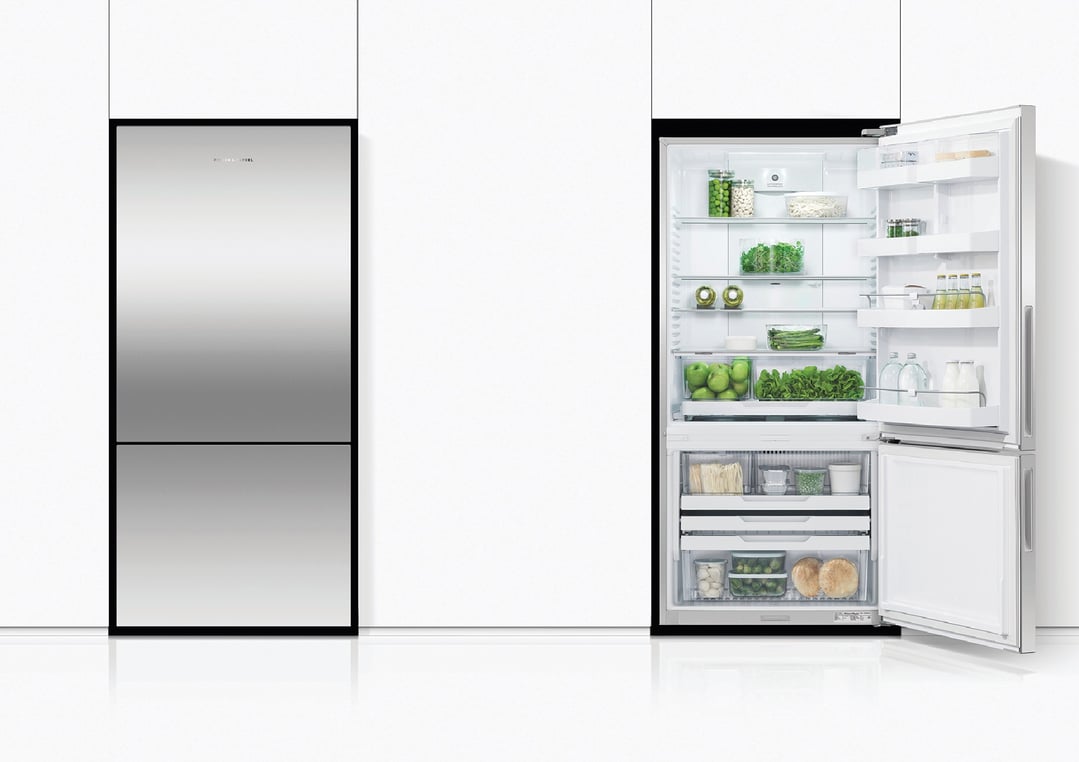 Open Series 5 Refrigerator Freezer with food inside, built into a white kitchen