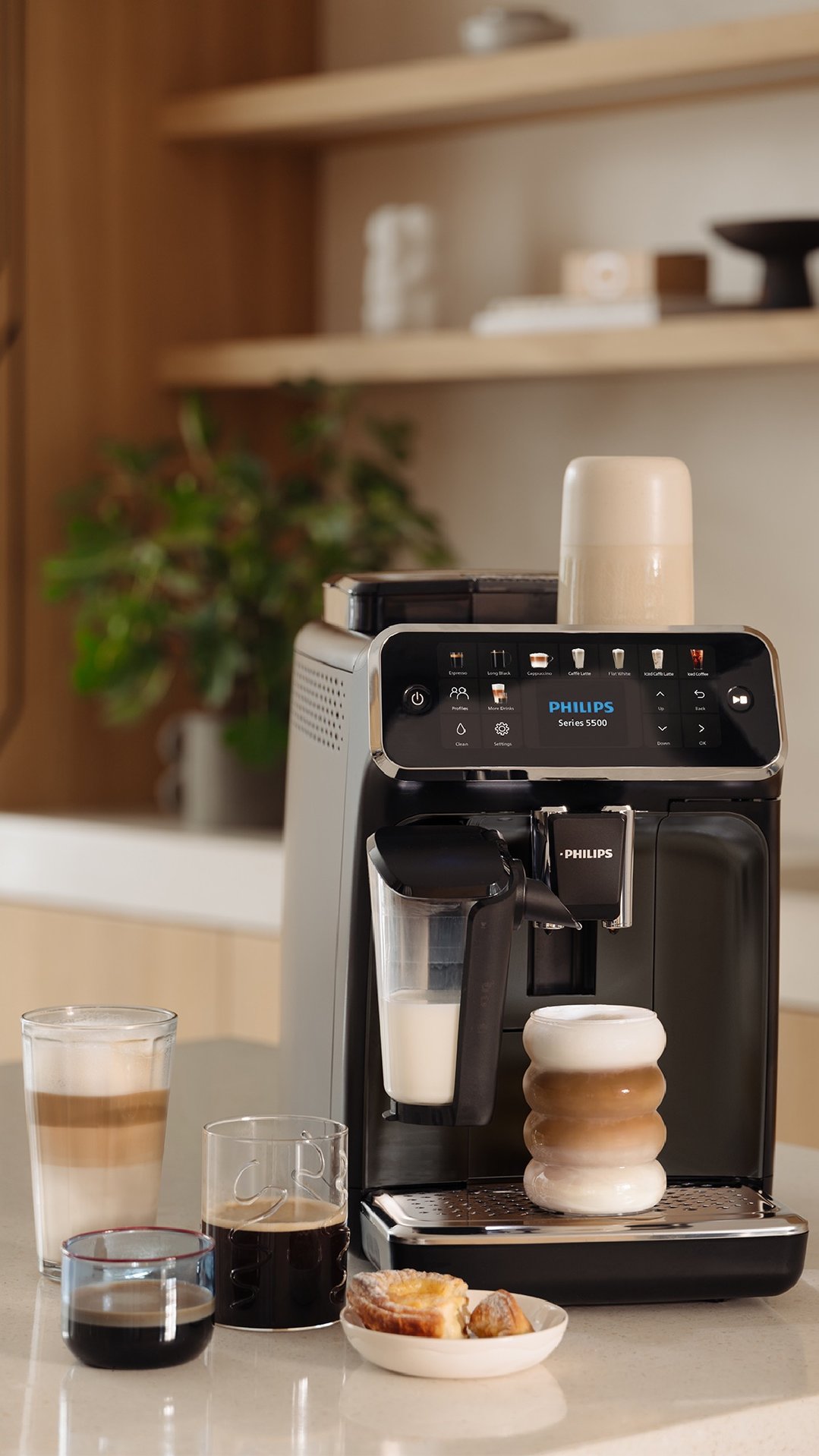Philips Series 5500 Fully Automatic Espresso Machine with various coffee drinks