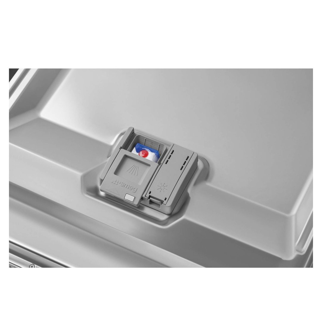Close up of a dishwasher's detergent dispenser with a tablet inside