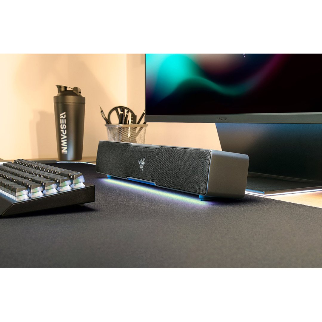 Razer Leviathan V2 X Gaming Soundbar on a desk with a keyboard and monitor