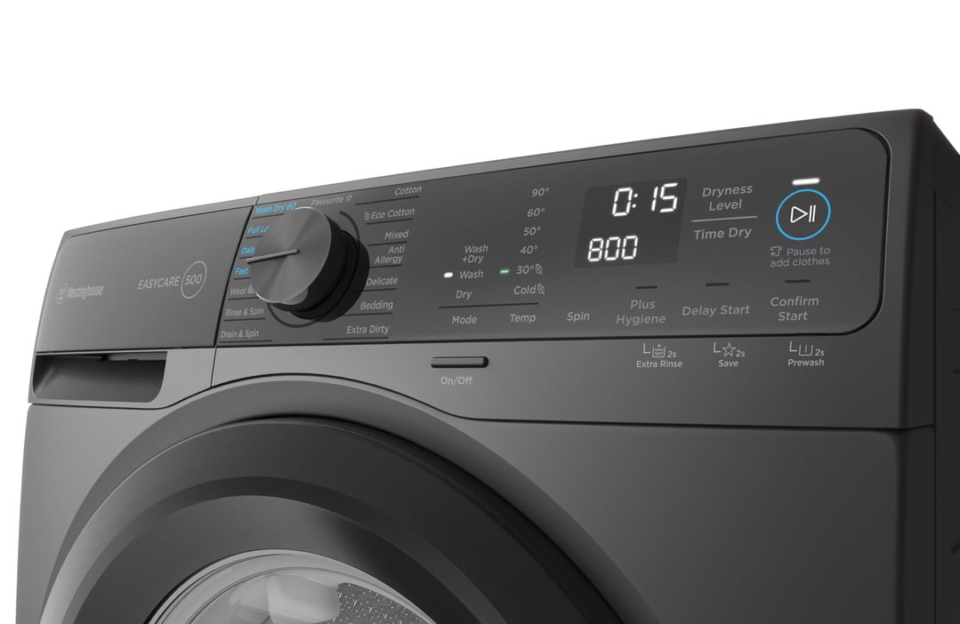 Close up of the control panel of a dark grey washer dryer combo