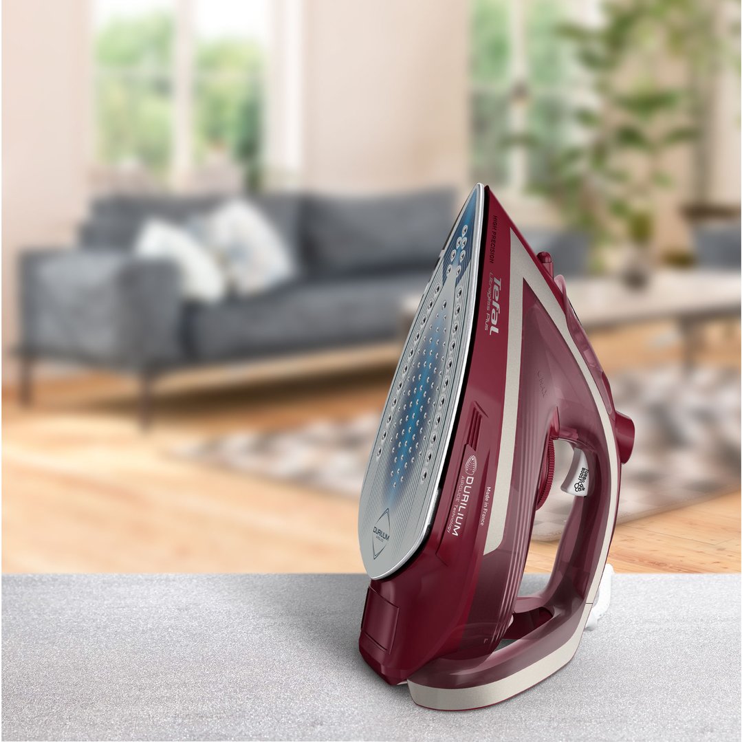Tefal Ultragliss Anti-Calc Plus steam iron on a table in a living room