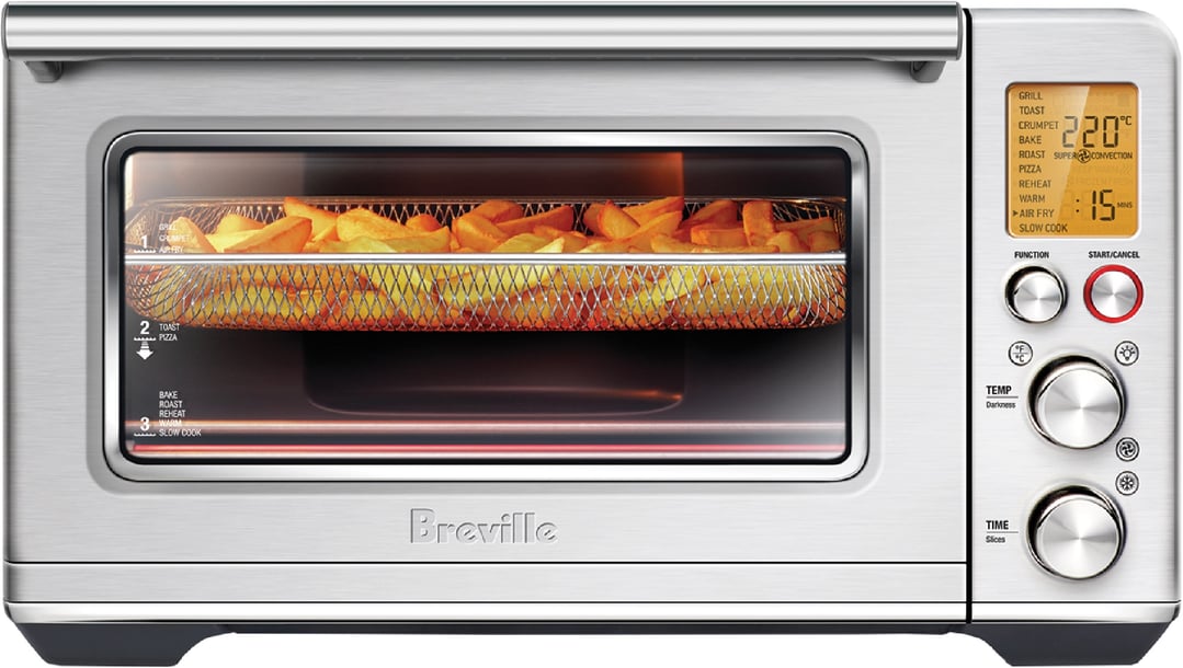 Breville Smart Oven Air Fryer with french fries cooking inside