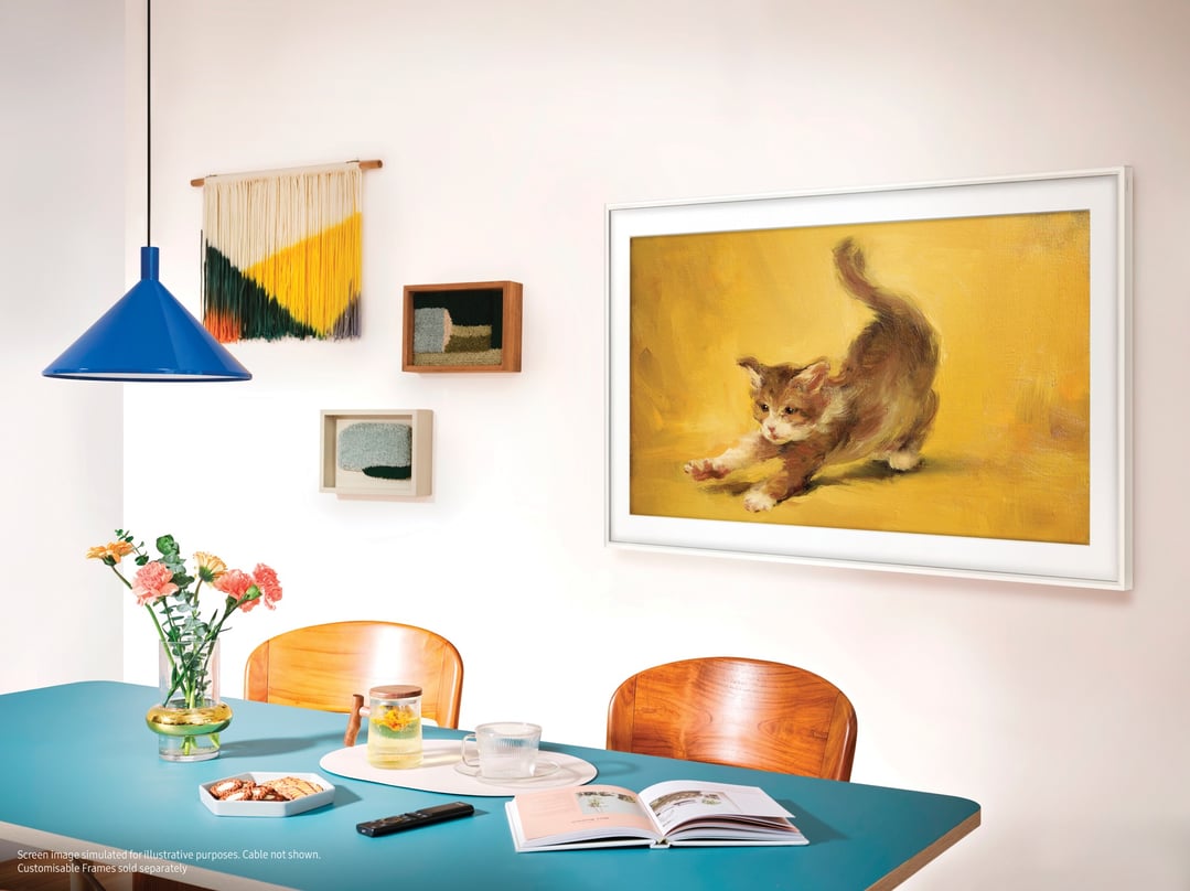 The Frame QLED 4K Smart TV displaying art in a dining room setting