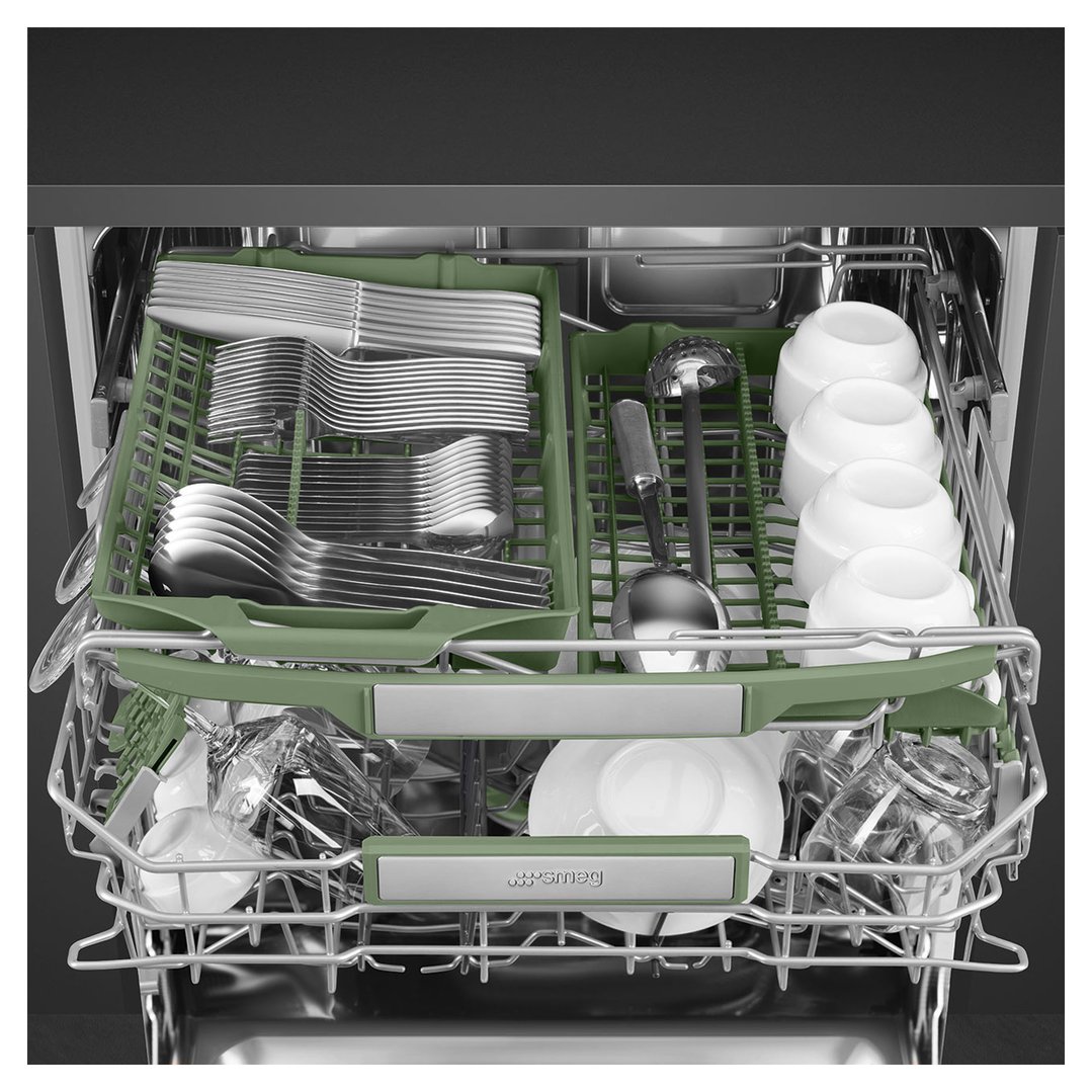 Close up of a dishwasher interior filled with dishes and cutlery