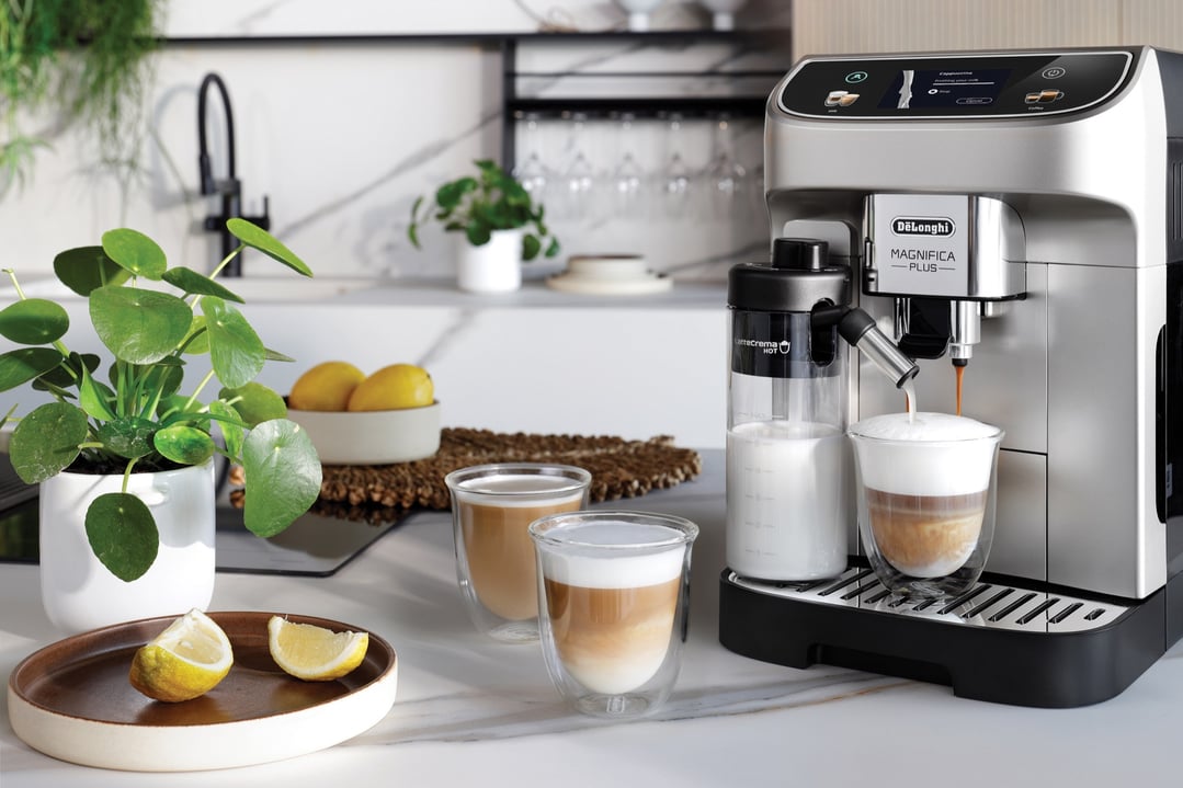 Magnifica Plus Fully Automatic Coffee Machine making coffee in a modern kitchen