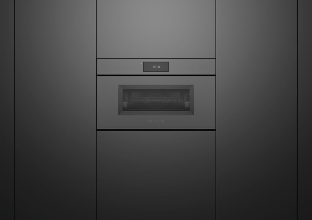 Built-in grey glass combi-steam oven with digital display showing 19:30