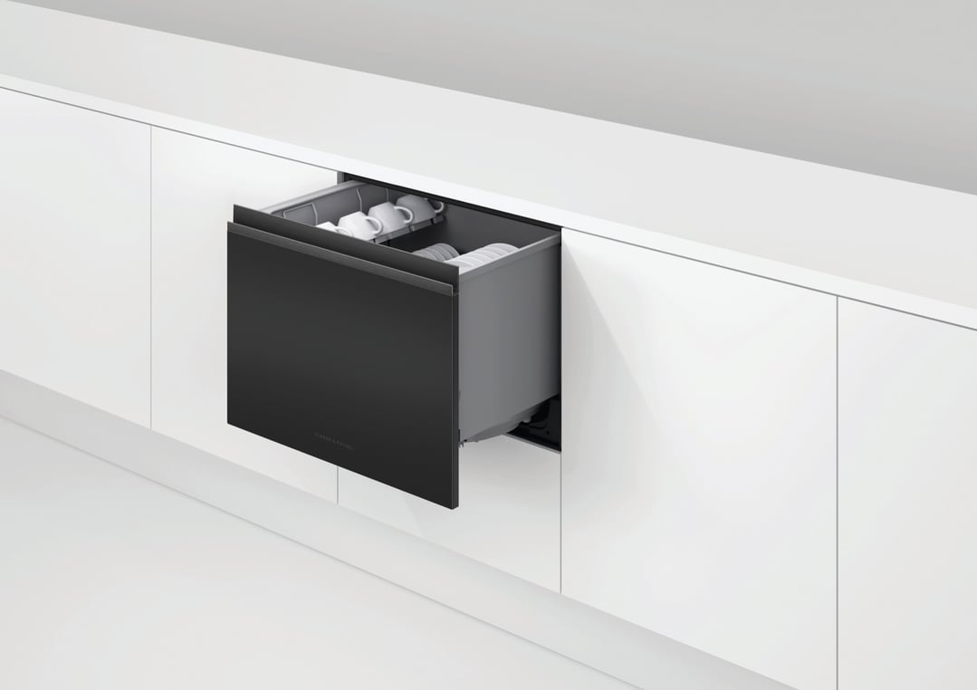 Black single DishDrawer dishwasher open in a white modern kitchen cabinet