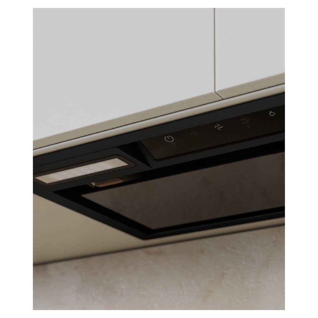 Black Haier rangehood integrated under white cabinetry in a kitchen