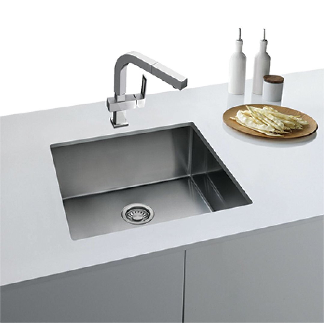 A stainless steel single bowl sink with a modern faucet in a kitchen setting