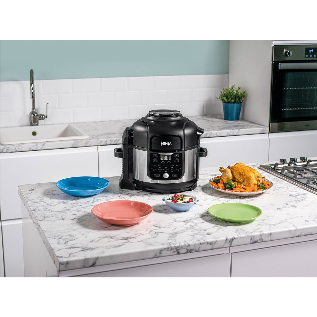 Ninja Foodi 11-in-1 6L Multi Cooker on a kitchen counter with food