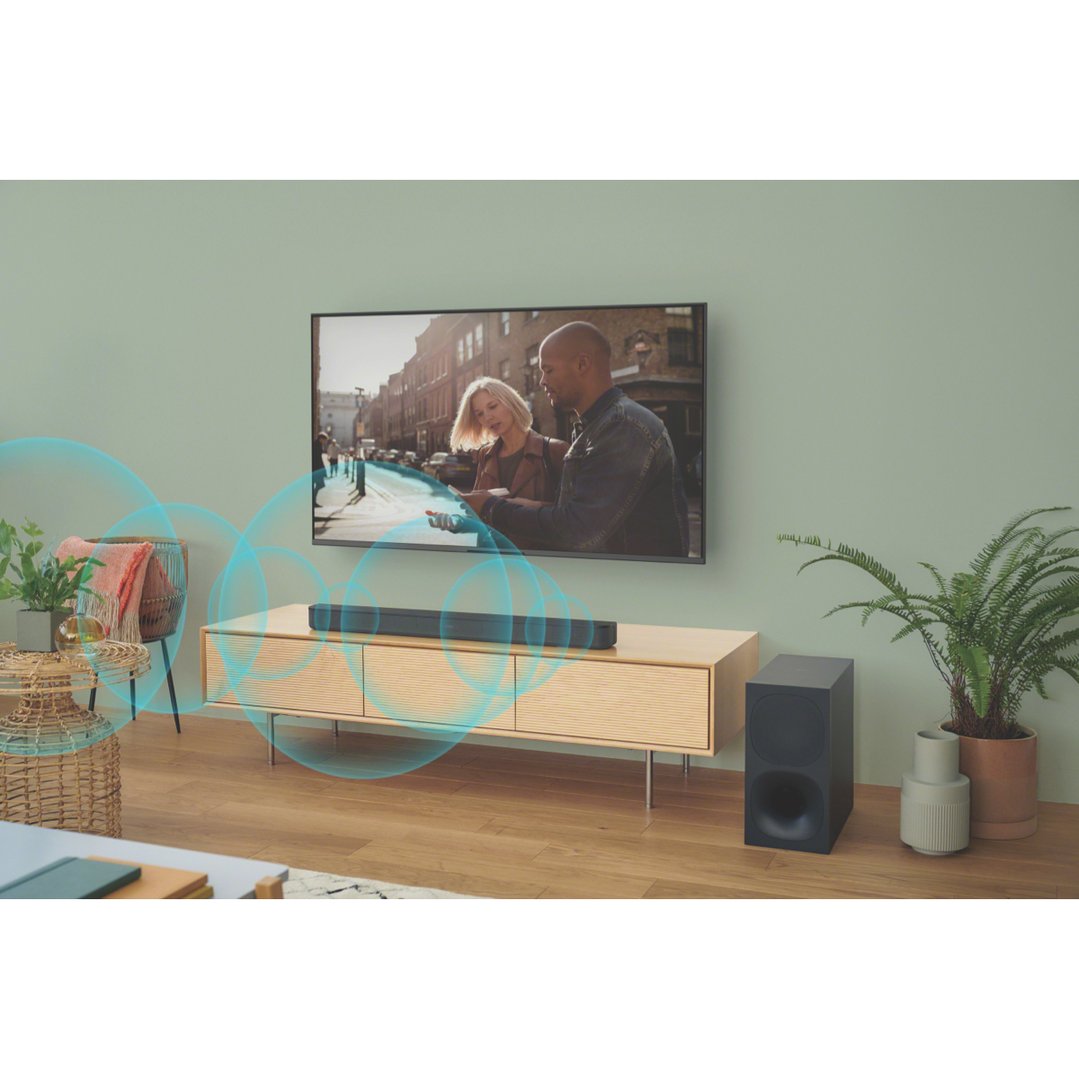 SONY soundbar and subwoofer in a living room with a TV showing a movie