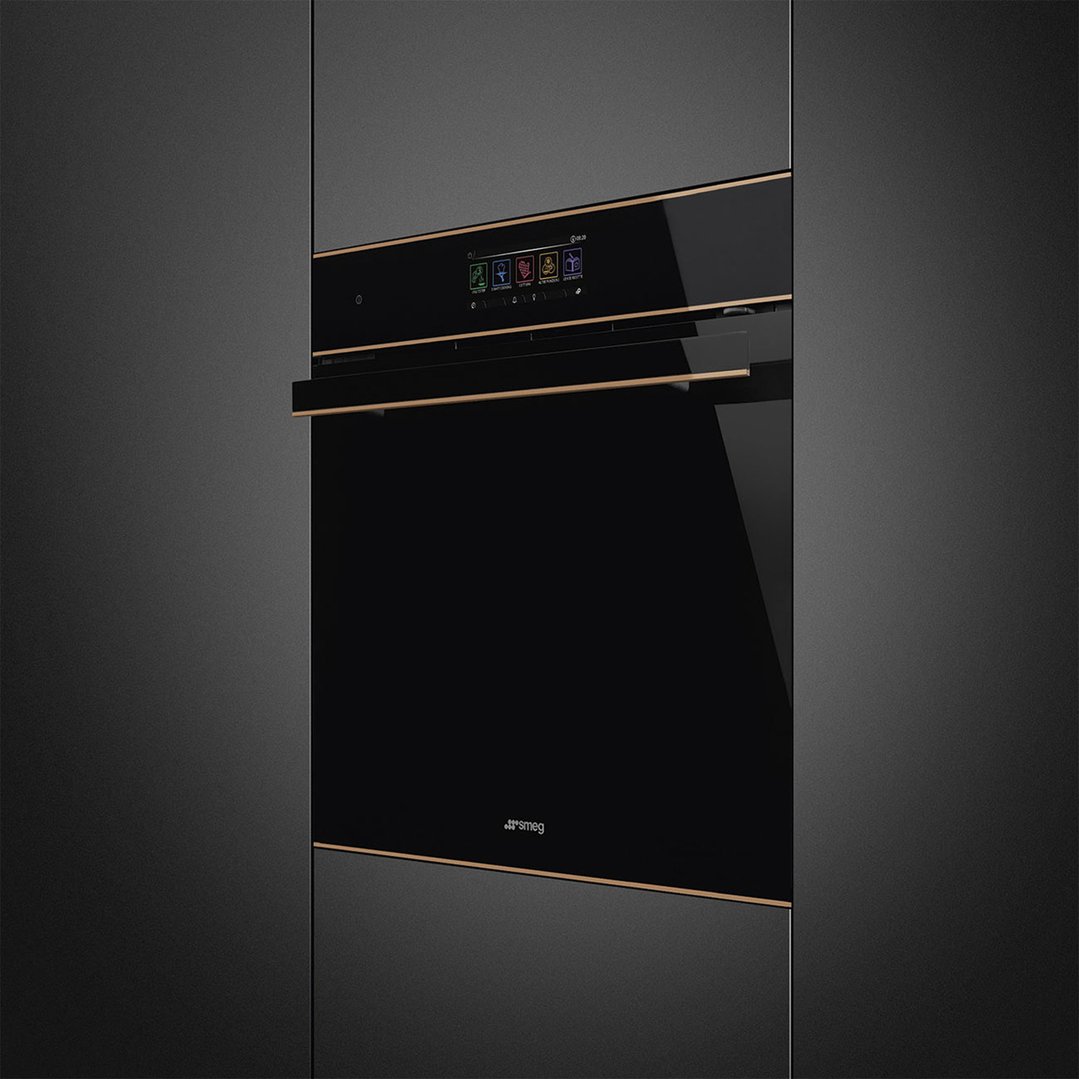 Black glass built-in oven with a digital display and bronze accents