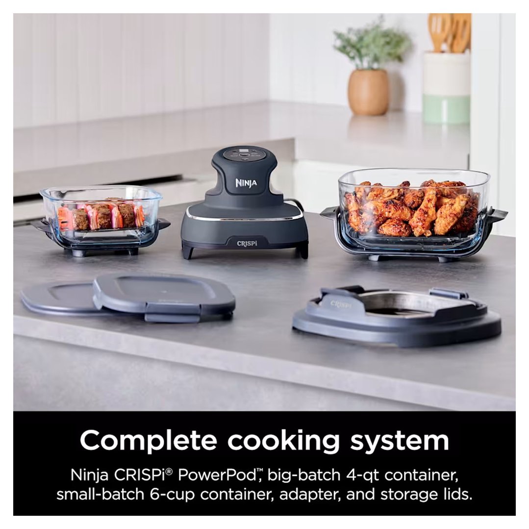 Ninja Crispi air fryer system with containers and lids on a kitchen counter
