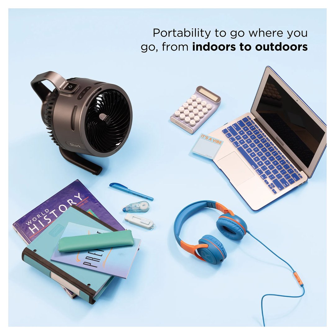 Shark FlexBreeze HydroGo fan on a desk with school supplies and laptop