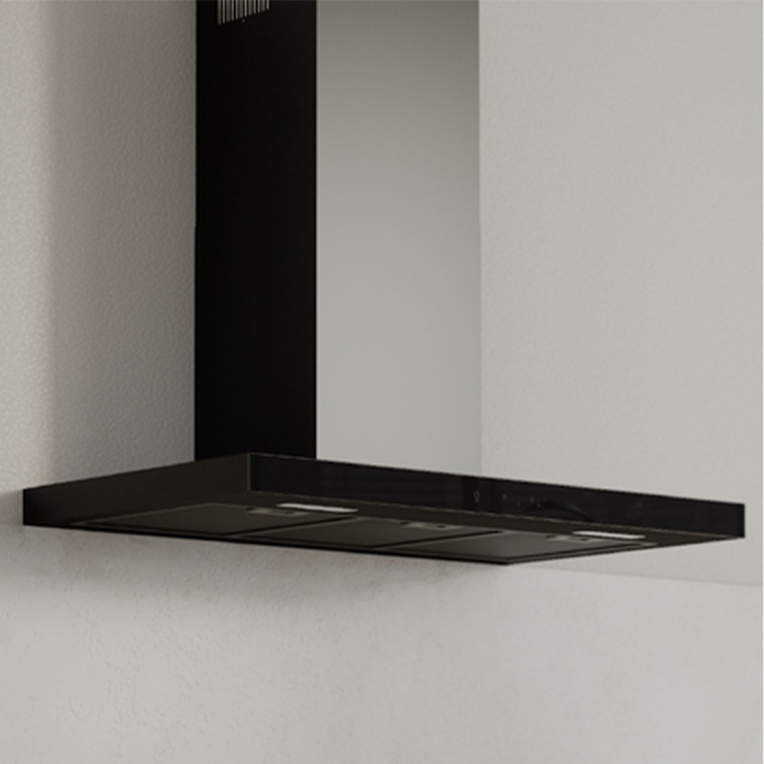 A black rangehood mounted on a light grey wall in a kitchen setting