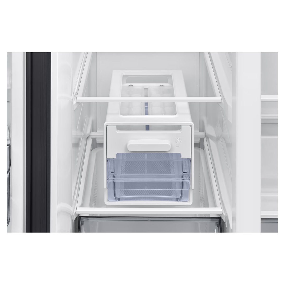 Close up of the interior of a refrigerator with an ice maker