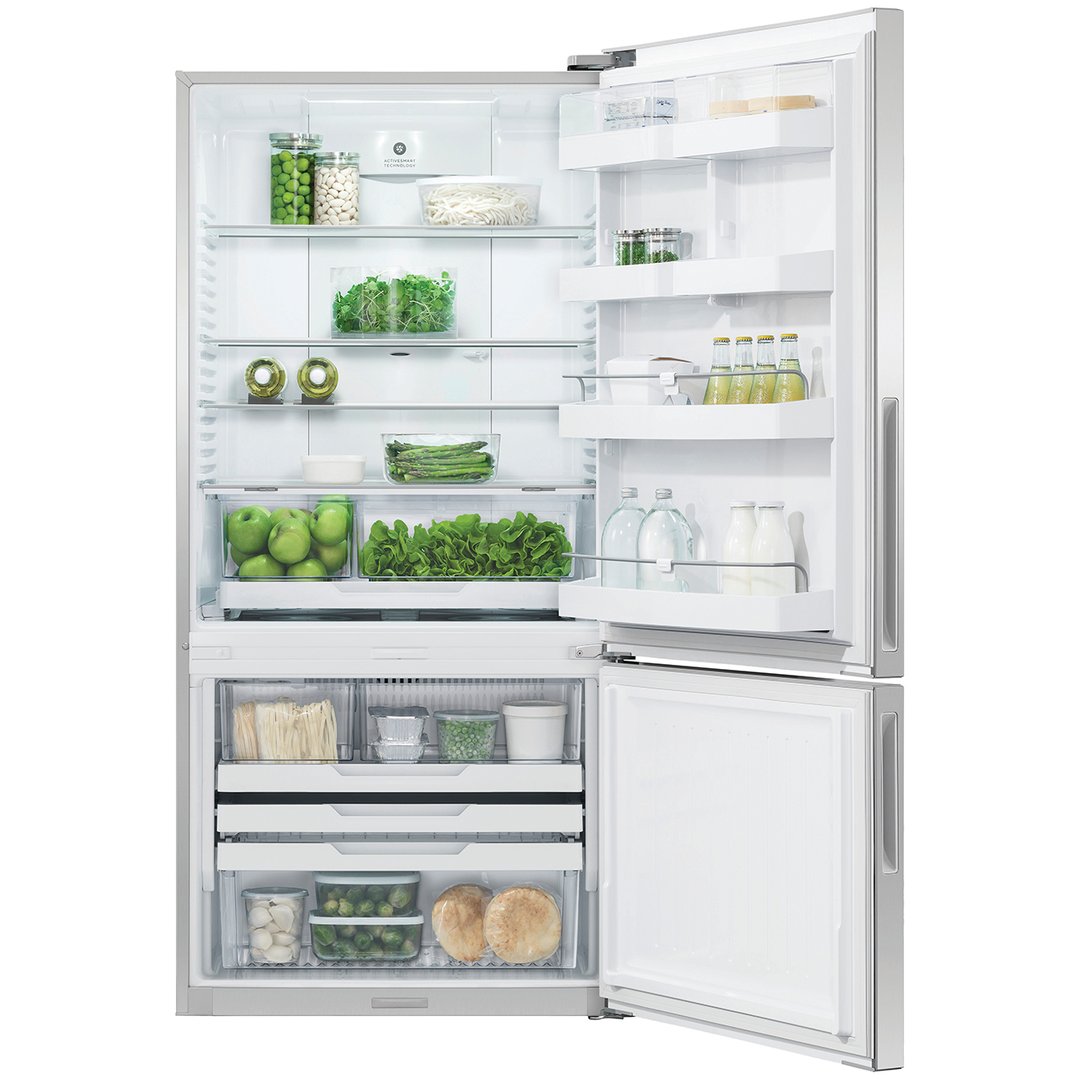 Open refrigerator freezer filled with various food items and beverages