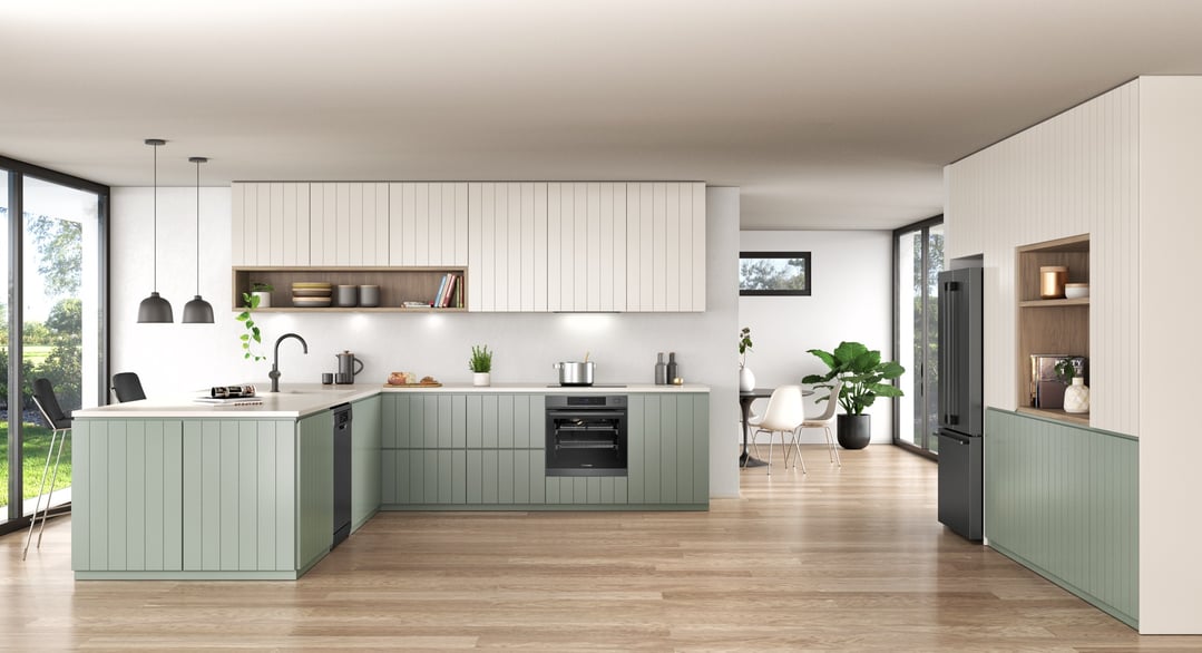 A modern kitchen with a built-in oven and a cooktop on the counter