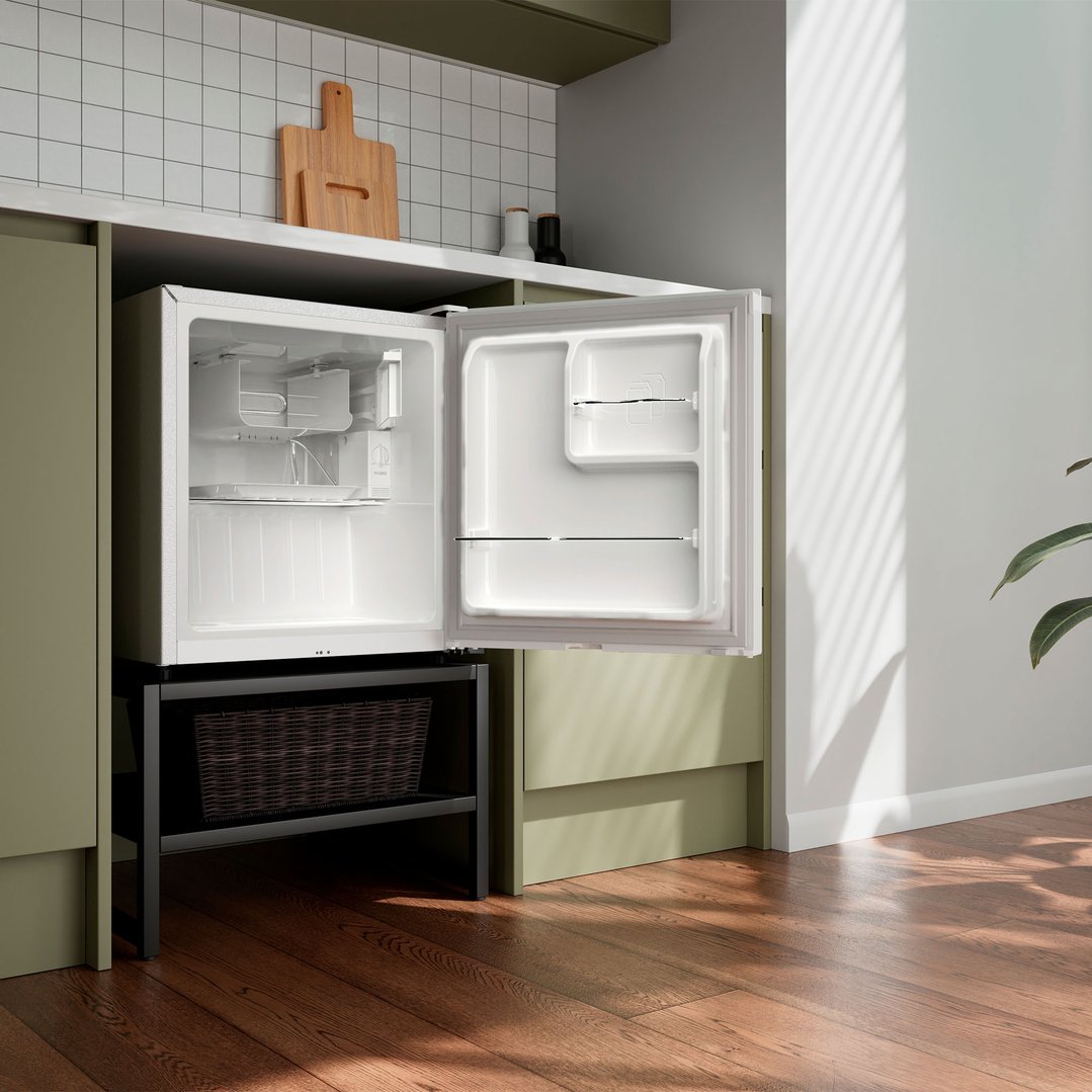 Bar refrigerator with open door in a modern kitchen setting