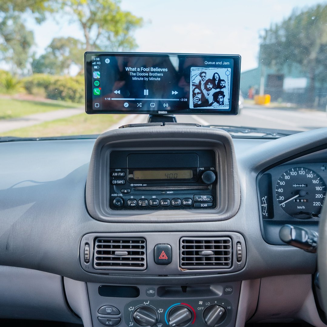 UNIDEN 10.26" Wireless Carplay, Android Auto Screen mounted on a car dashboard