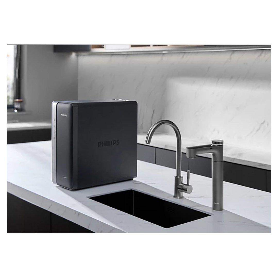 Philips Reverse Osmosis purification system and tap on a kitchen counter with sink