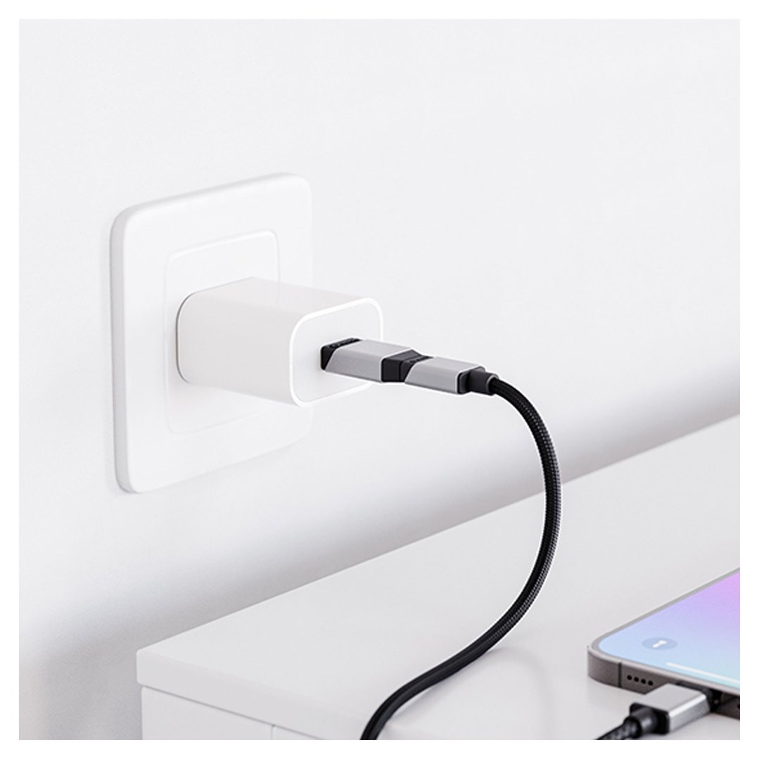 USB-A to USB-C Mini Adapter charging a smartphone from a wall outlet
