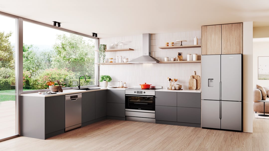 Modern kitchen with a built-in oven, dishwasher, and large refrigerator