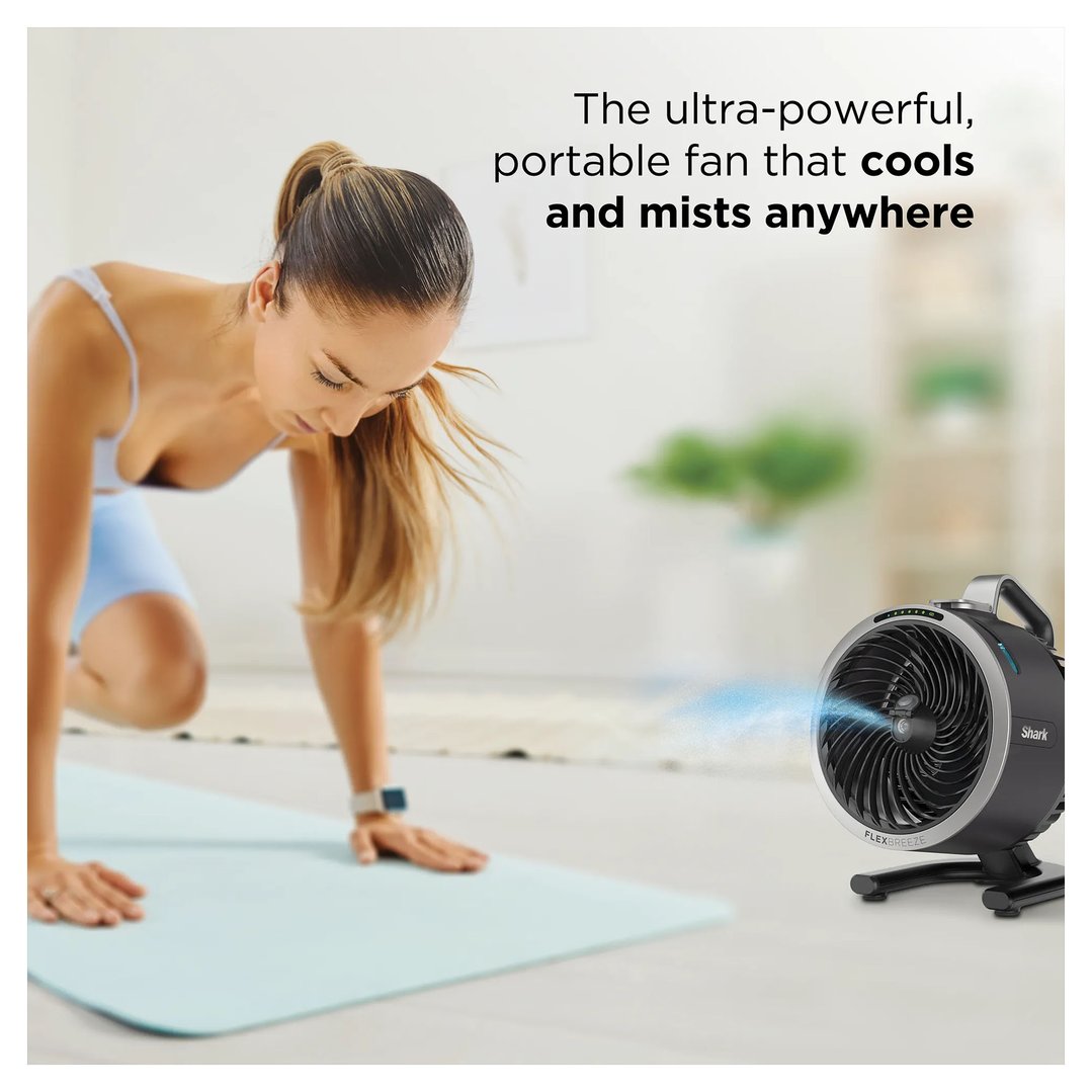 Woman exercising on a mat with a Shark FlexBreeze HydroGo misting portable fan