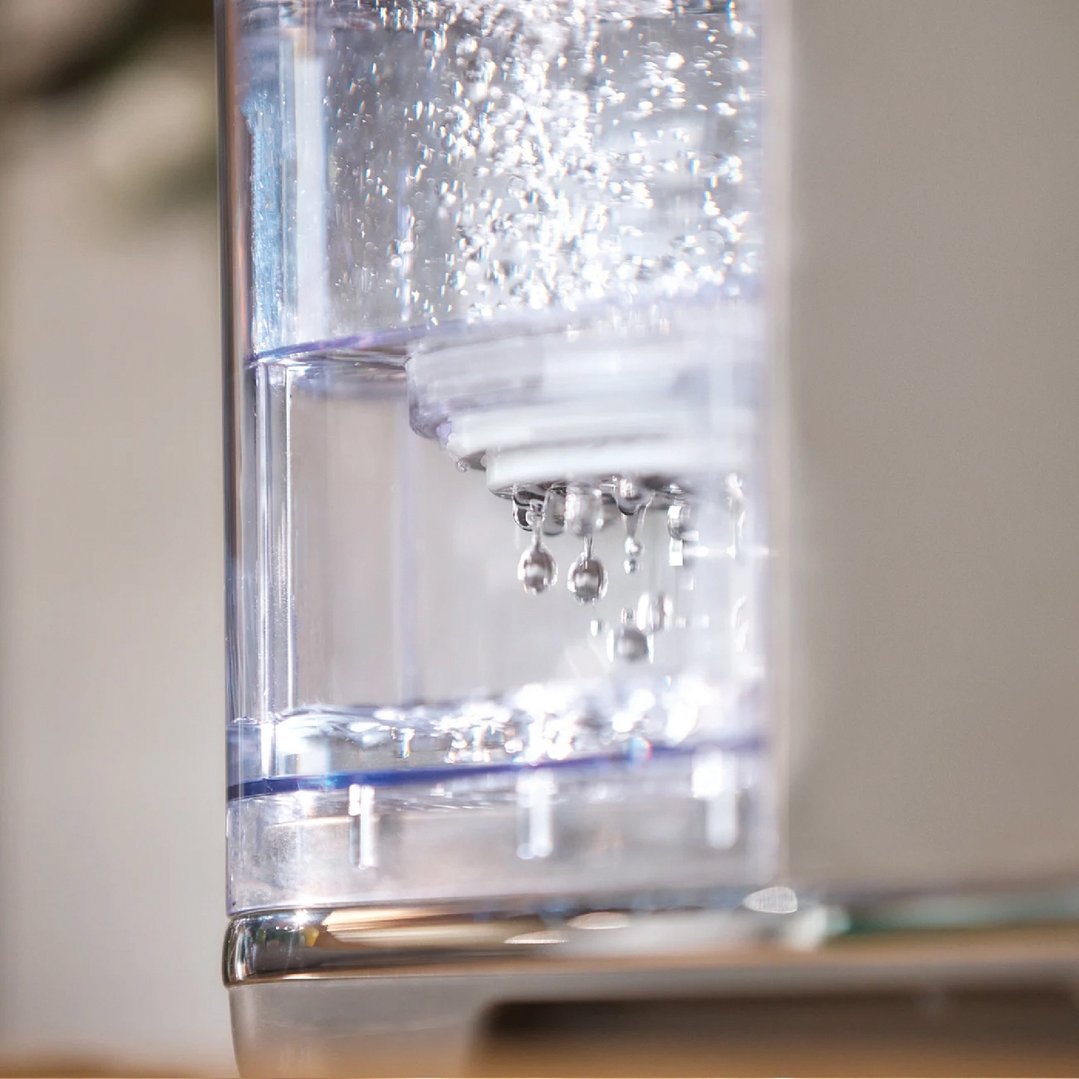 Close up of water dripping from the AquaStation Hot Water Dispenser