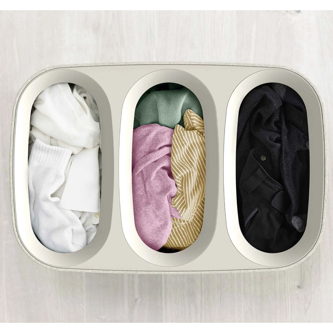 Tota Trio 90L Ecru Laundry Separation Basket filled with sorted laundry
