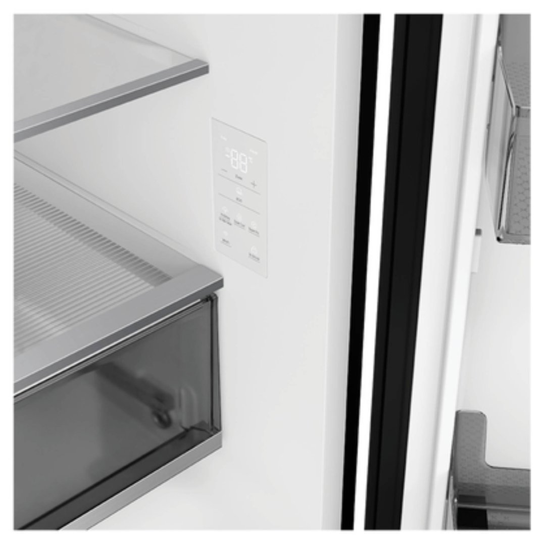 Interior of a refrigerator freezer with shelves and a control panel