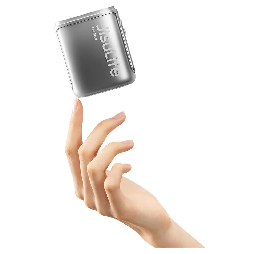 Hand balancing a silver JISULIFE 4IN1 WEARABLE NECK Fan