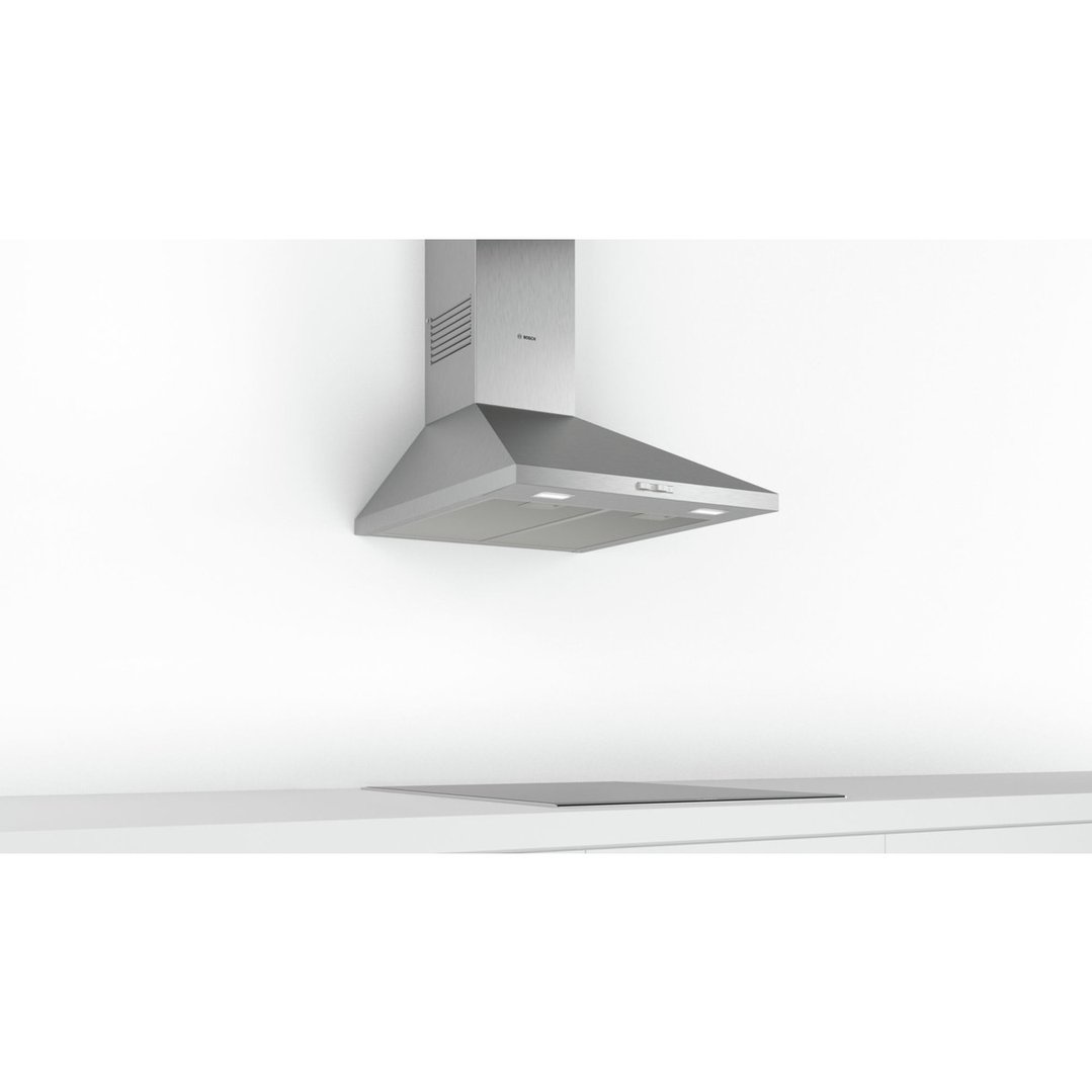 A Bosch Serie 2 canopy rangehood installed above a cooktop in a modern kitchen