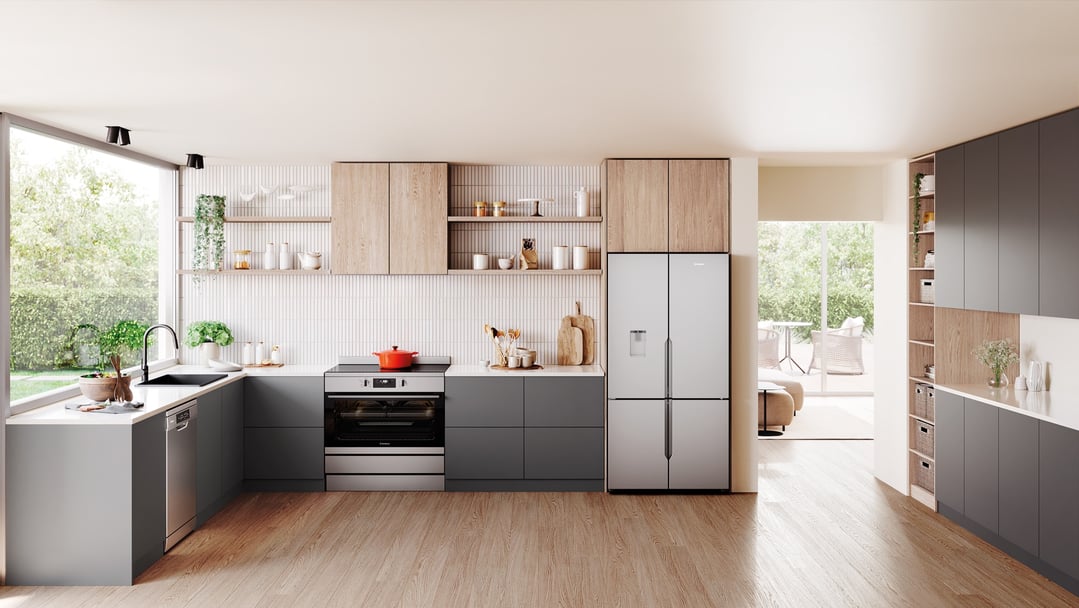 Modern kitchen with a built-in electric freestanding oven and large refrigerator