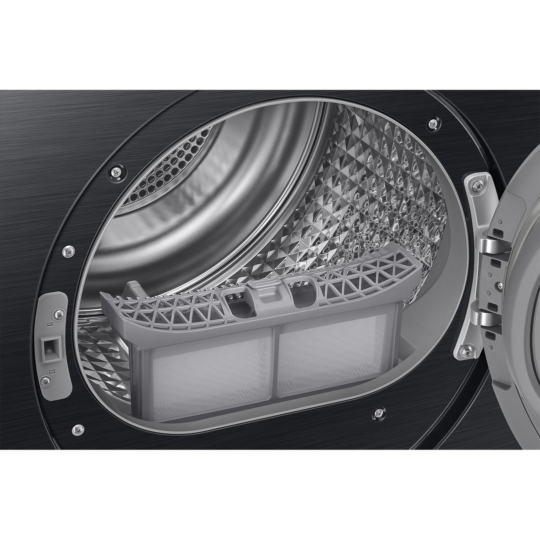 Close-up of the open drum and lint filter of a black Samsung dryer