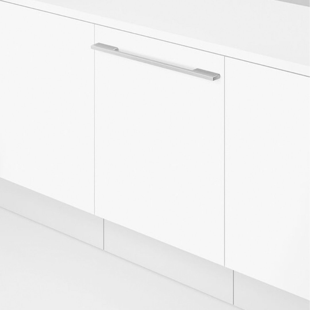 Integrated dishwasher with a long silver handle in a white kitchen setting