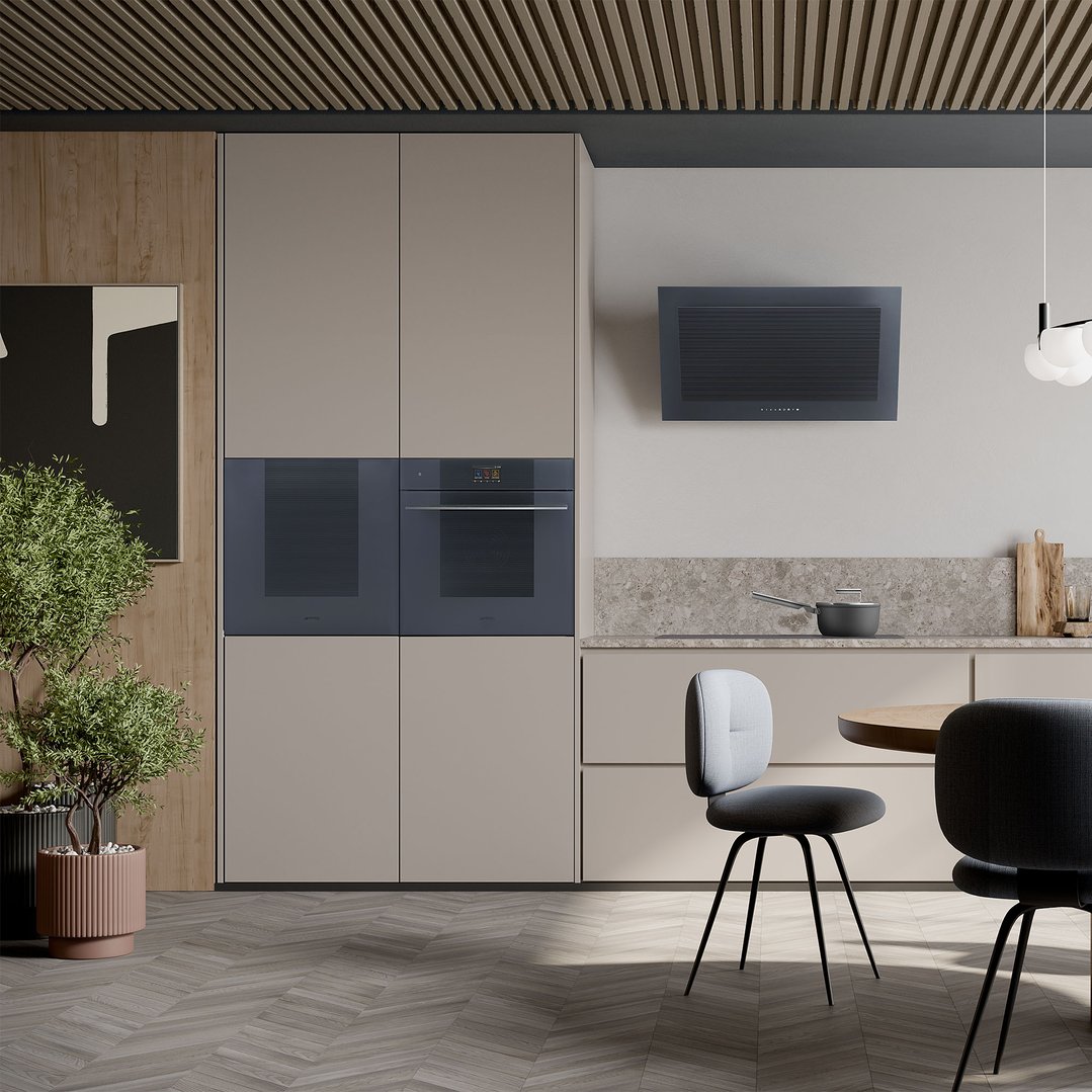 Built-in ovens and cooktop in a modern kitchen with dining area