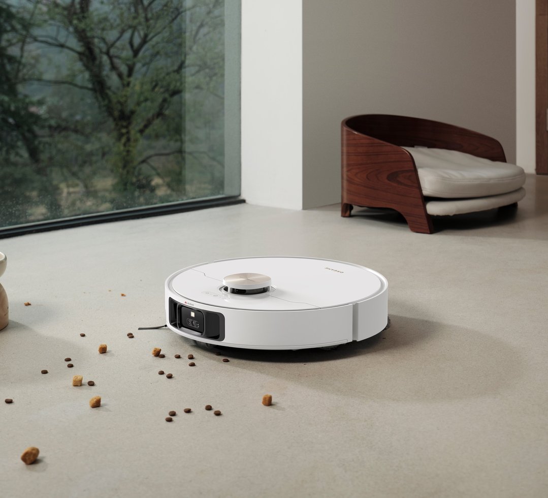 L50 Ultra Robot Vacuum and Mop cleaning up spilled food on a light floor