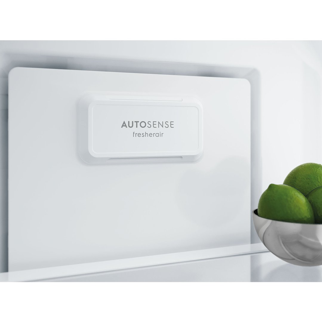 Close up of the fridge interior with an "AUTOSENSE fresherair" feature and limes