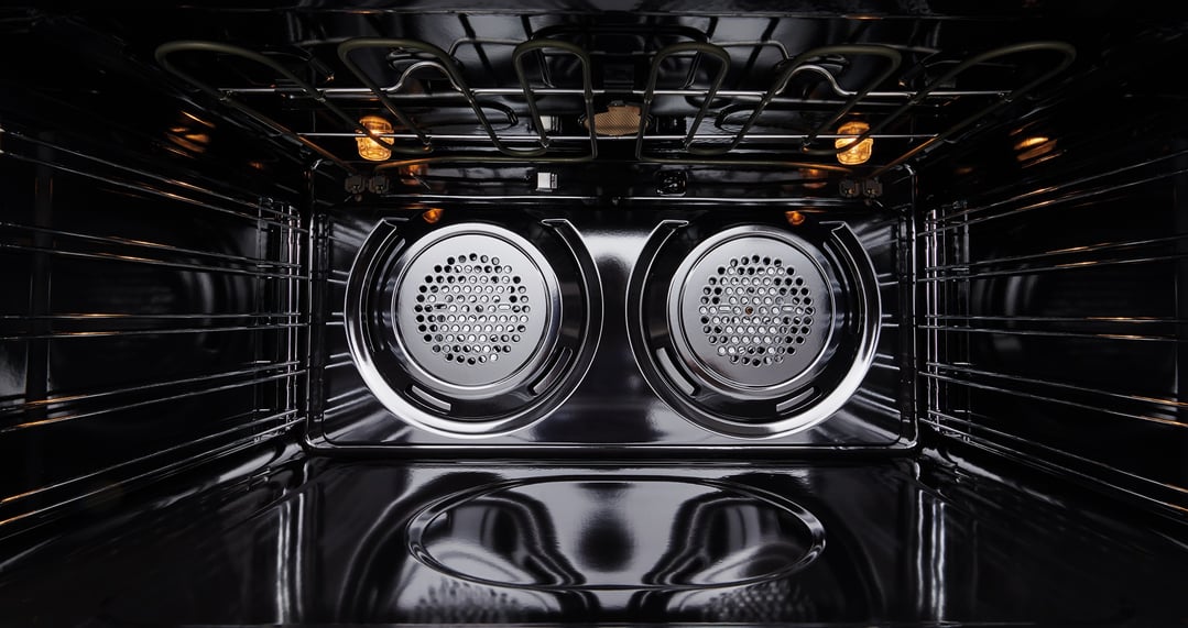 Interior view of a Westinghouse oven with racks and heating elements