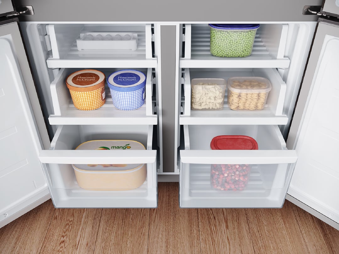 Open Westinghouse quad door fridge showing various food items inside